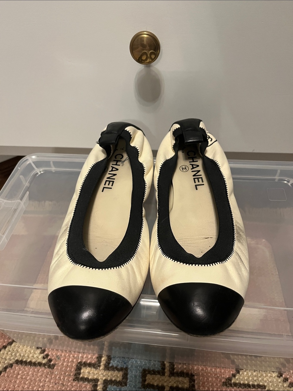 CHANEL Cream Leather Ballet Flats with Black Cap Toes